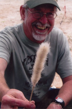 Bo Brown with a thistledown-fletched blowgun dart.